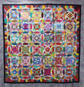 CIRCUS-M3, 36 Ring Circus Quilt Along Month #3 by JoAnne Louis. Contains Blocks #7-9.